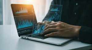 Person analyzing data on laptop for fraud prevention